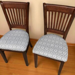 two chairs on a wood floor