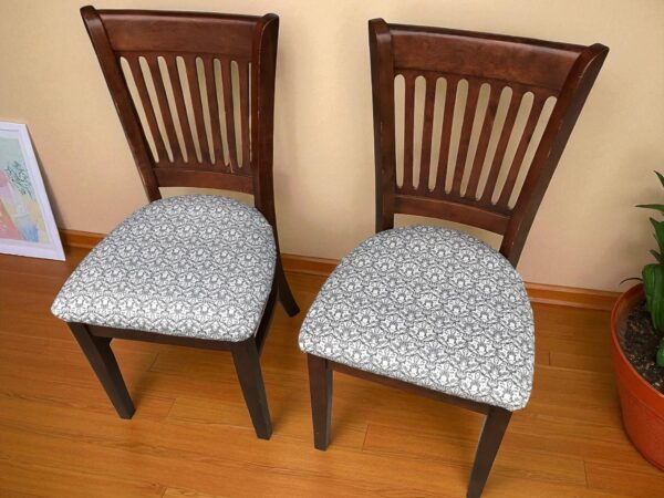 two chairs on a wood floor