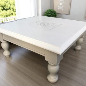 a white square table in a room